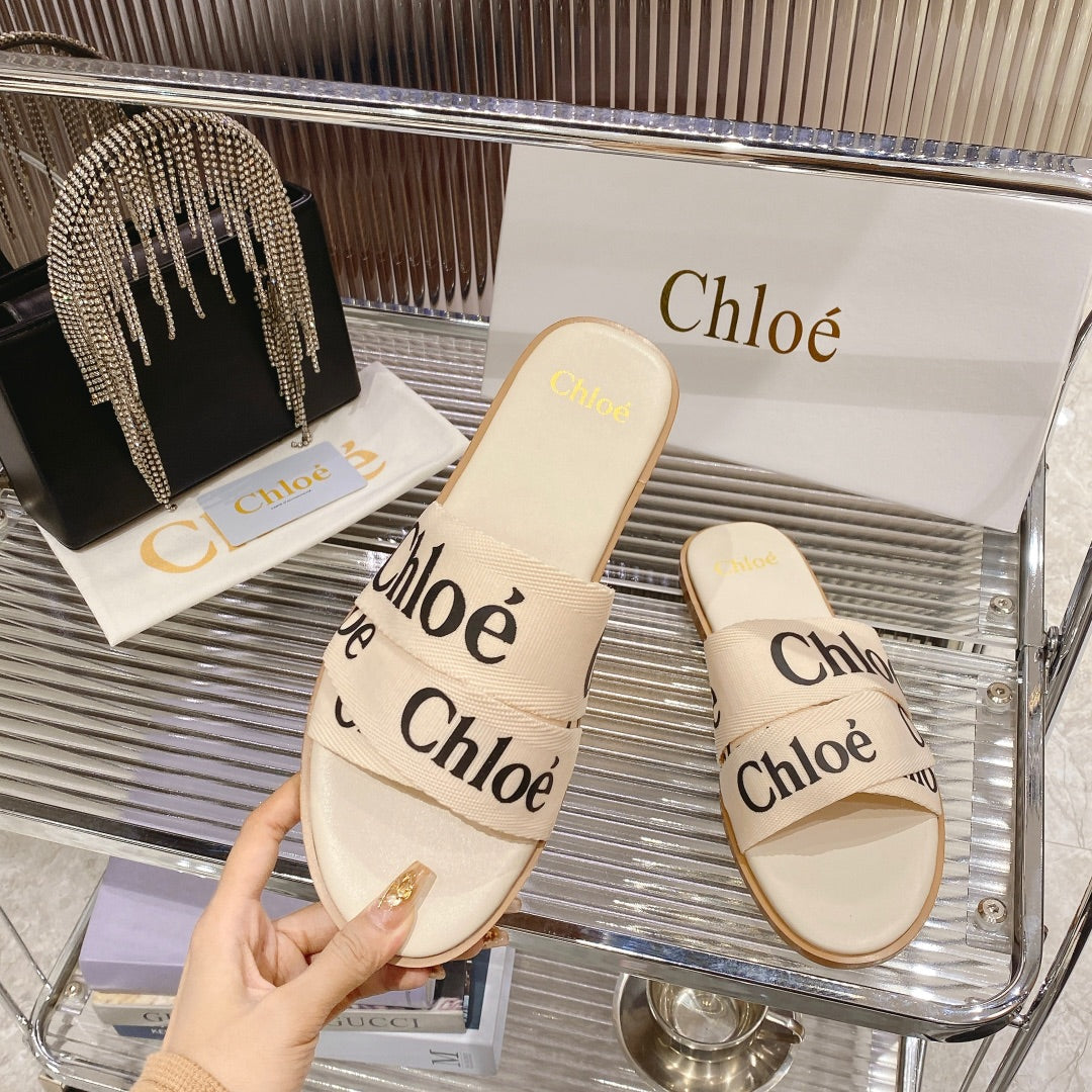 WOODY SLIPPER IN BEIGE MIX BLACK CANVAS