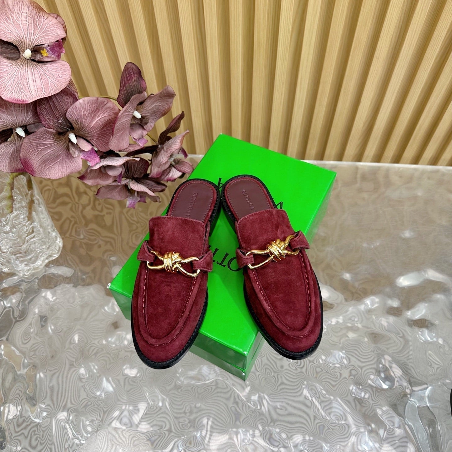 BOTTEGA VENETA OPEN-BACK LOAFER REALISED IN GARNET RED SUEDE WITH SIGNATURE METALLIC KNOT DETAIL