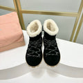LACE-UP ANKLE BOOTS IN BLACK SUEDE AND FLEECE LINING