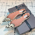 ALAIA FLAT SLINGBACK IN BLACK MIX WHITE PATENT CALFSKIN AND FILM