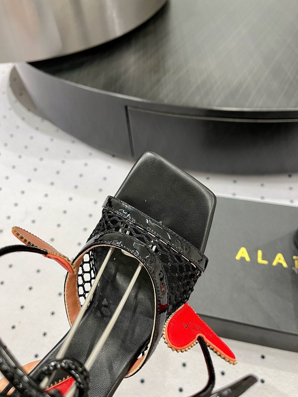 ALAIA BANQUET WEDGE SANDALS IN BLACK LAMBSKIN WITH RED HEART