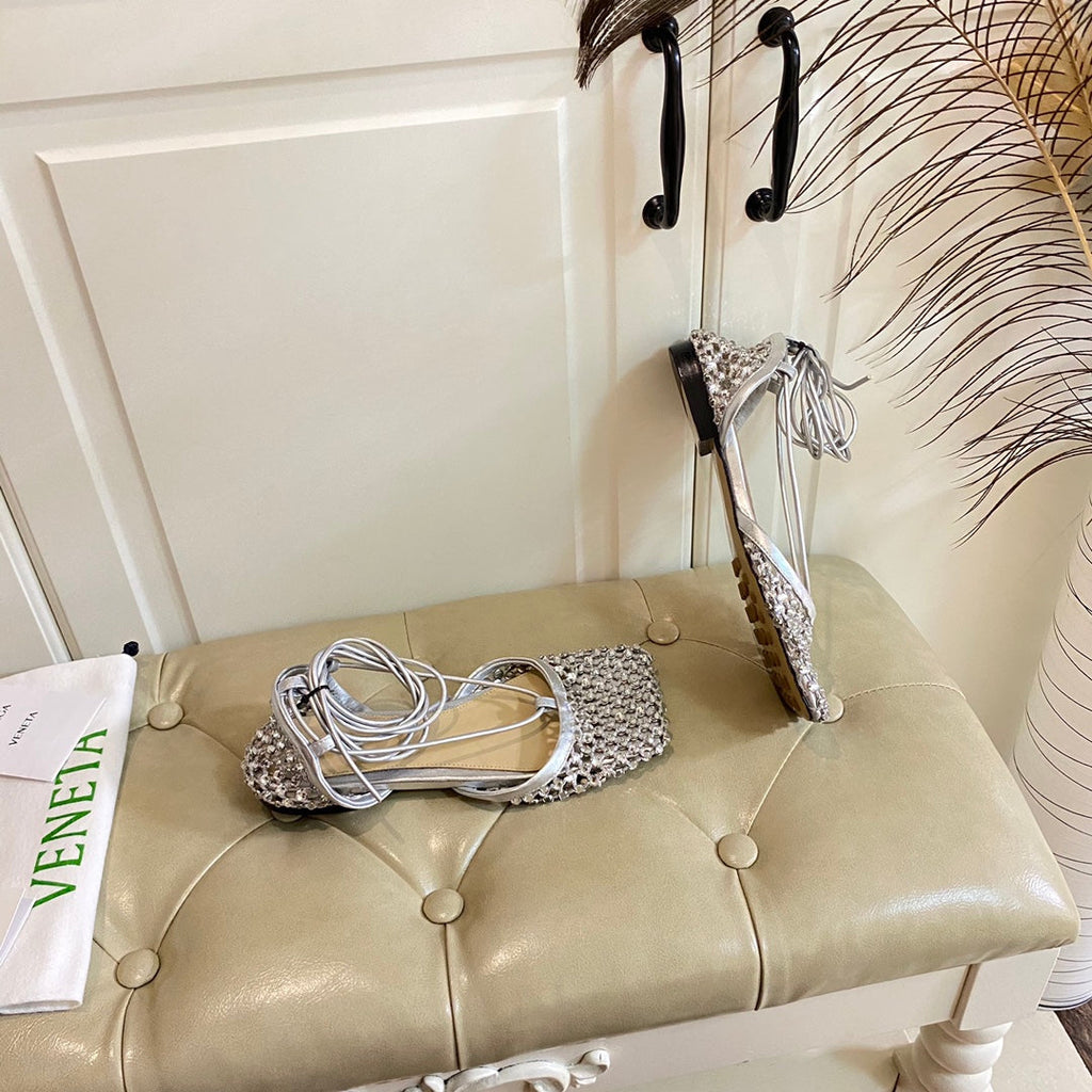 BOTTEGA VENETA LACE-UP FLAT SANDAL IN SILVER METALLIZED MESH AND LEATHER WITH RHINSTONES