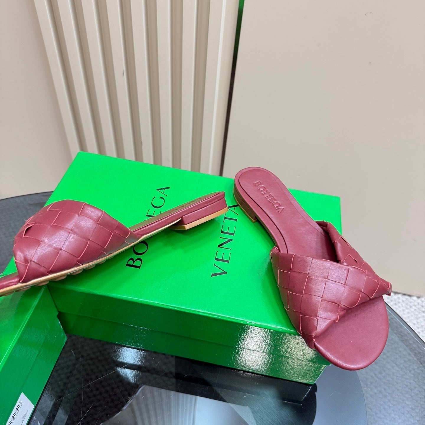 BOTTEGA VENETA BLINK FLAT MULE IN BERRY RED INTRECCIATO LEATHER