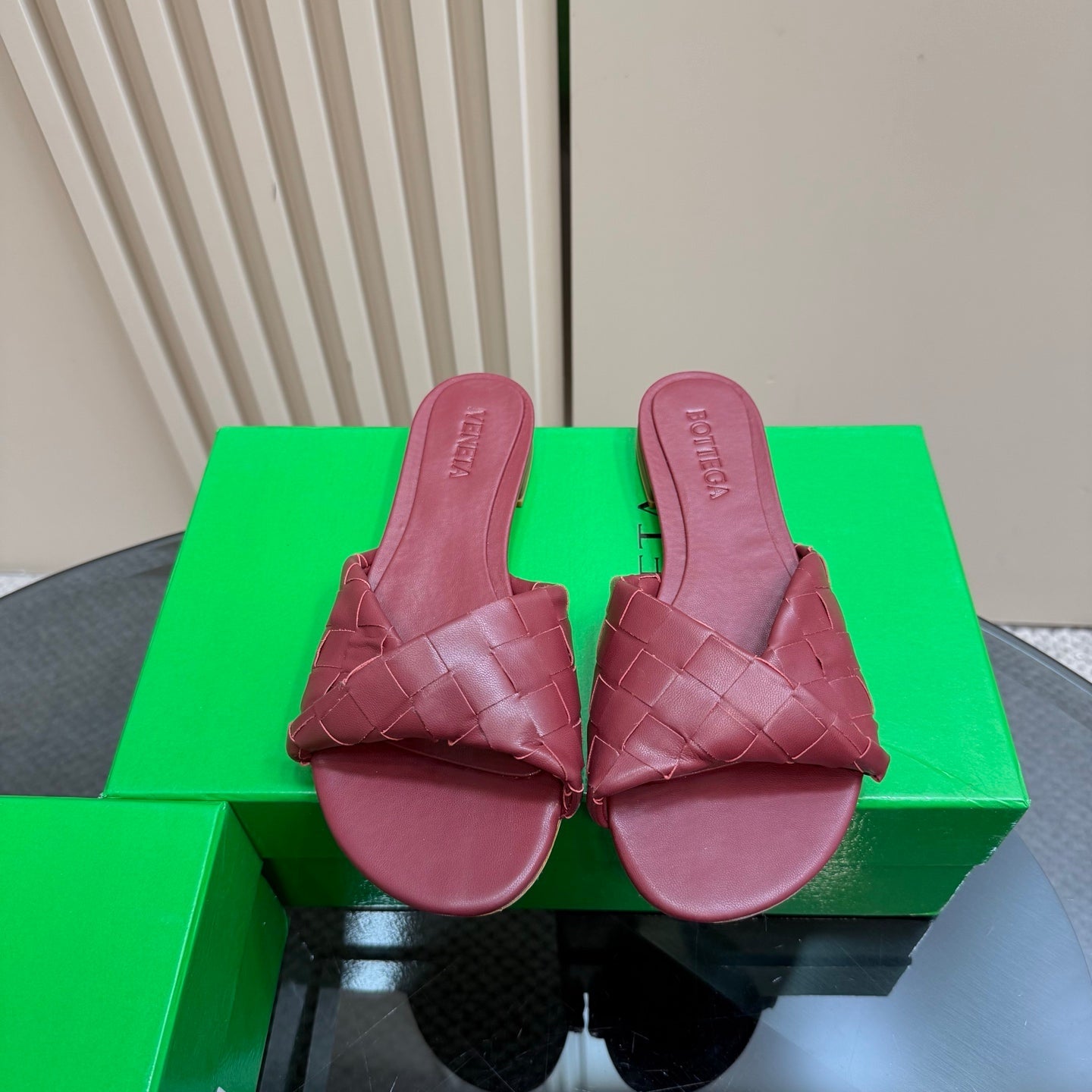 BOTTEGA VENETA BLINK FLAT MULE IN BERRY RED INTRECCIATO LEATHER